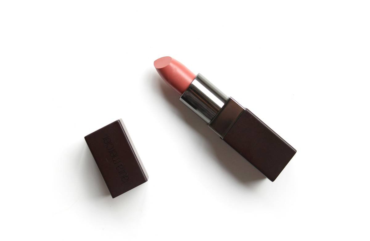 Infographic comparing film-forming vs. traditional lip liner ingredients showing polymer content percentages