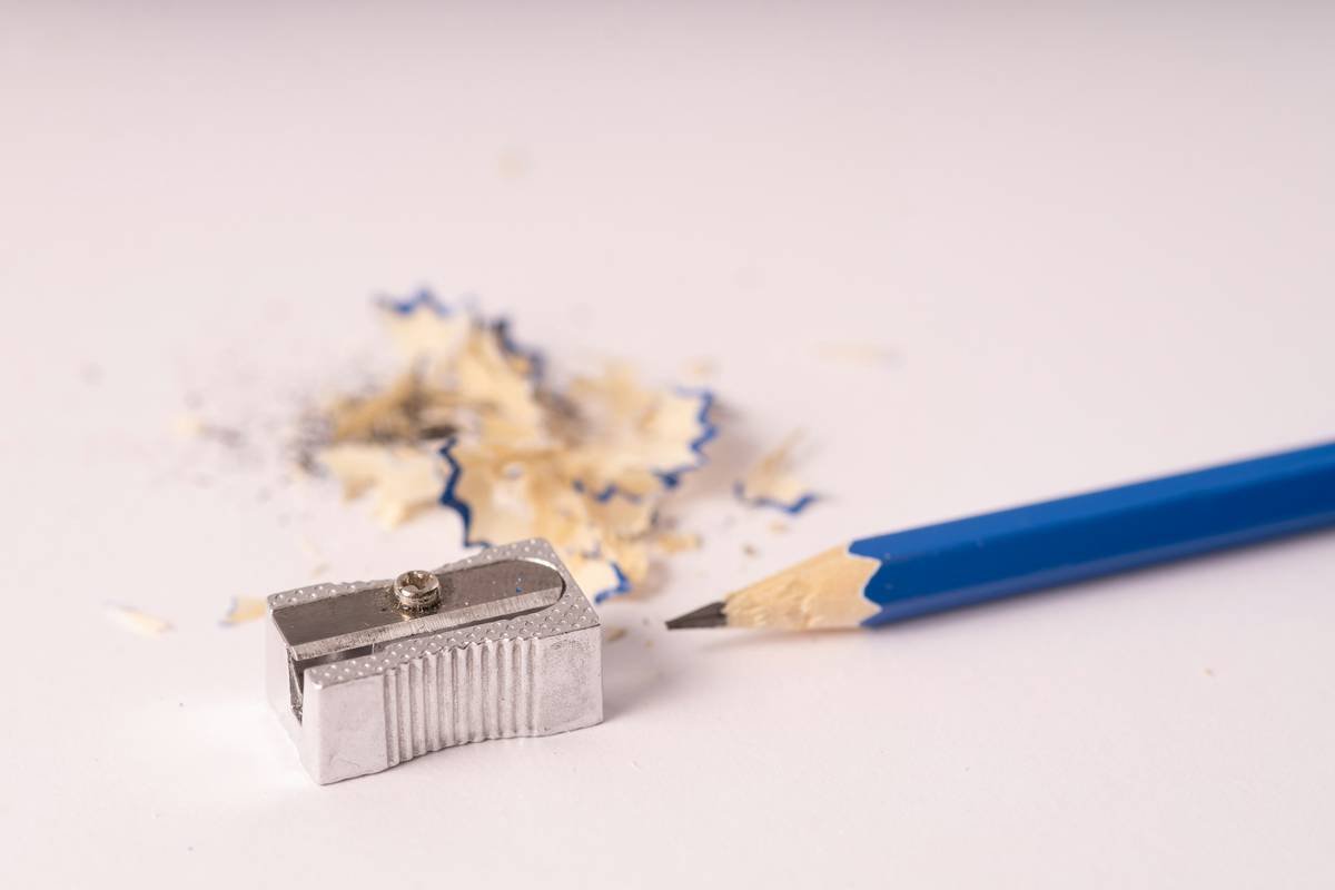 Comparison of dirty vs clean lip liner sharpener showing results of how to clean lip liner sharpener