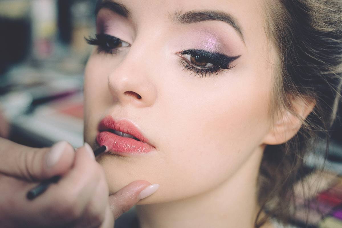 Close-up of irritated lips after misusing lip enhancer liner what happen if applied incorrectly